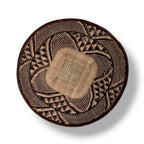 A African binga basket in plain background