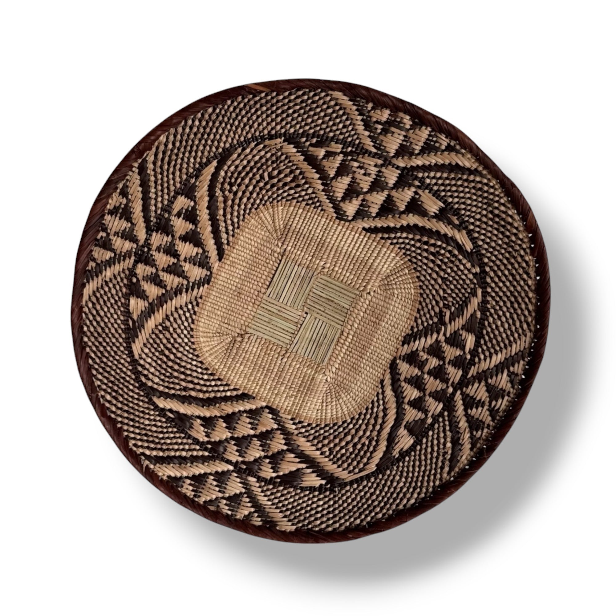 A African binga basket in plain background