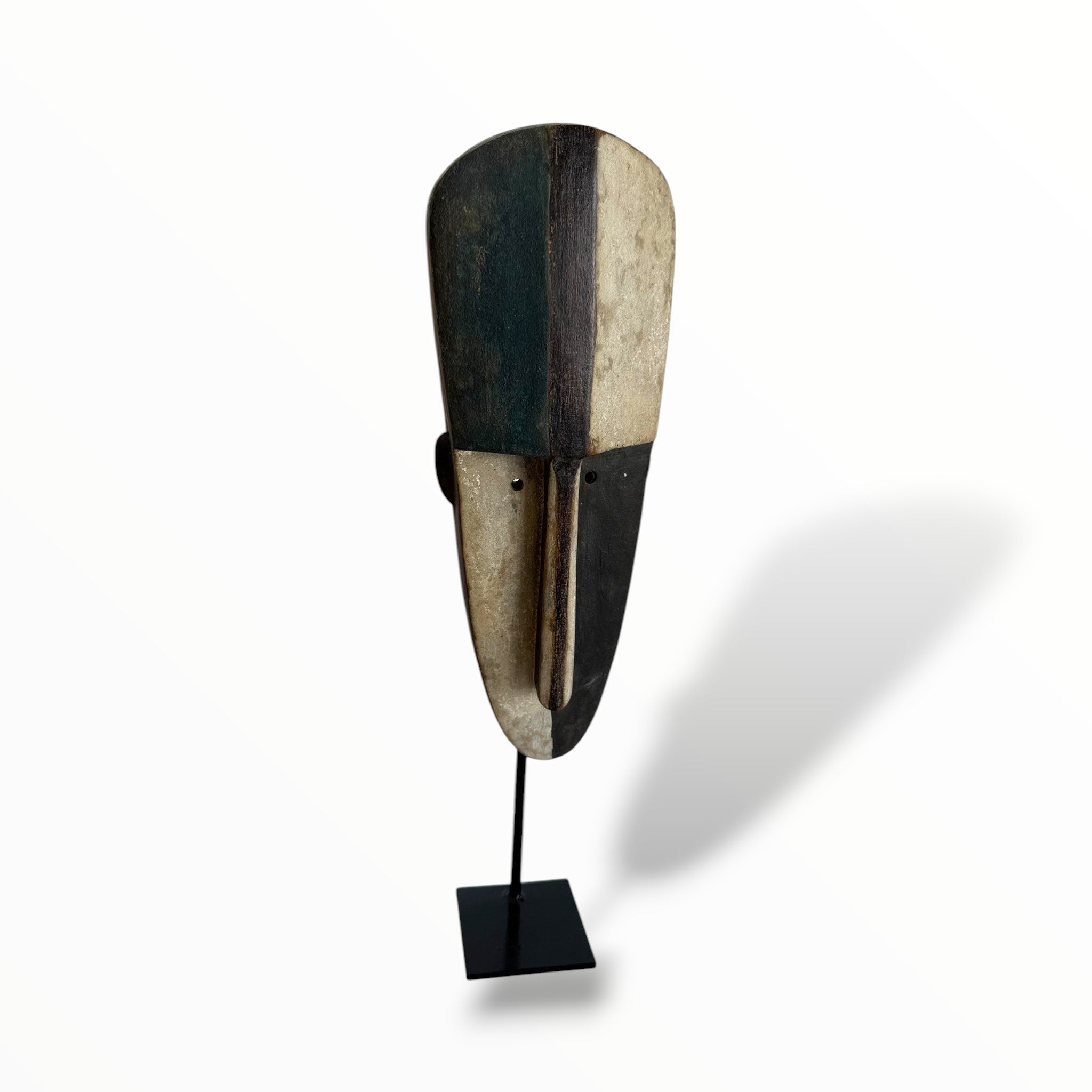 Fang Ngil Mask on stand